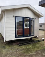 CASA MÓVIL FORMA L (10,35 X 8,55 M)